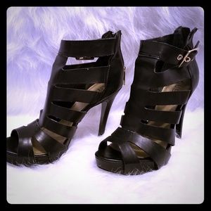 Sexy black head turning gladiator heels